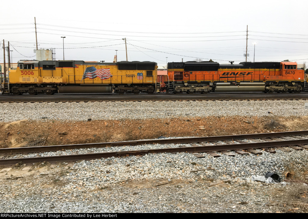 BNSF 8470 coupled to a friendly foe